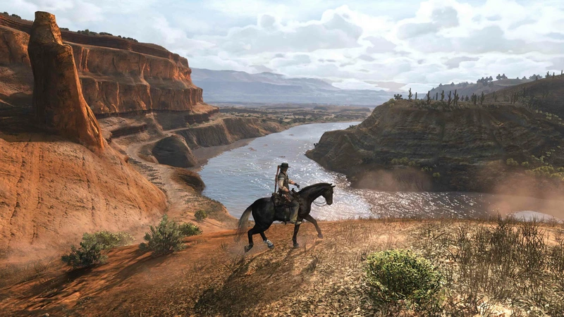 Джон Марстон верхом у реки в Red Dead Redemption